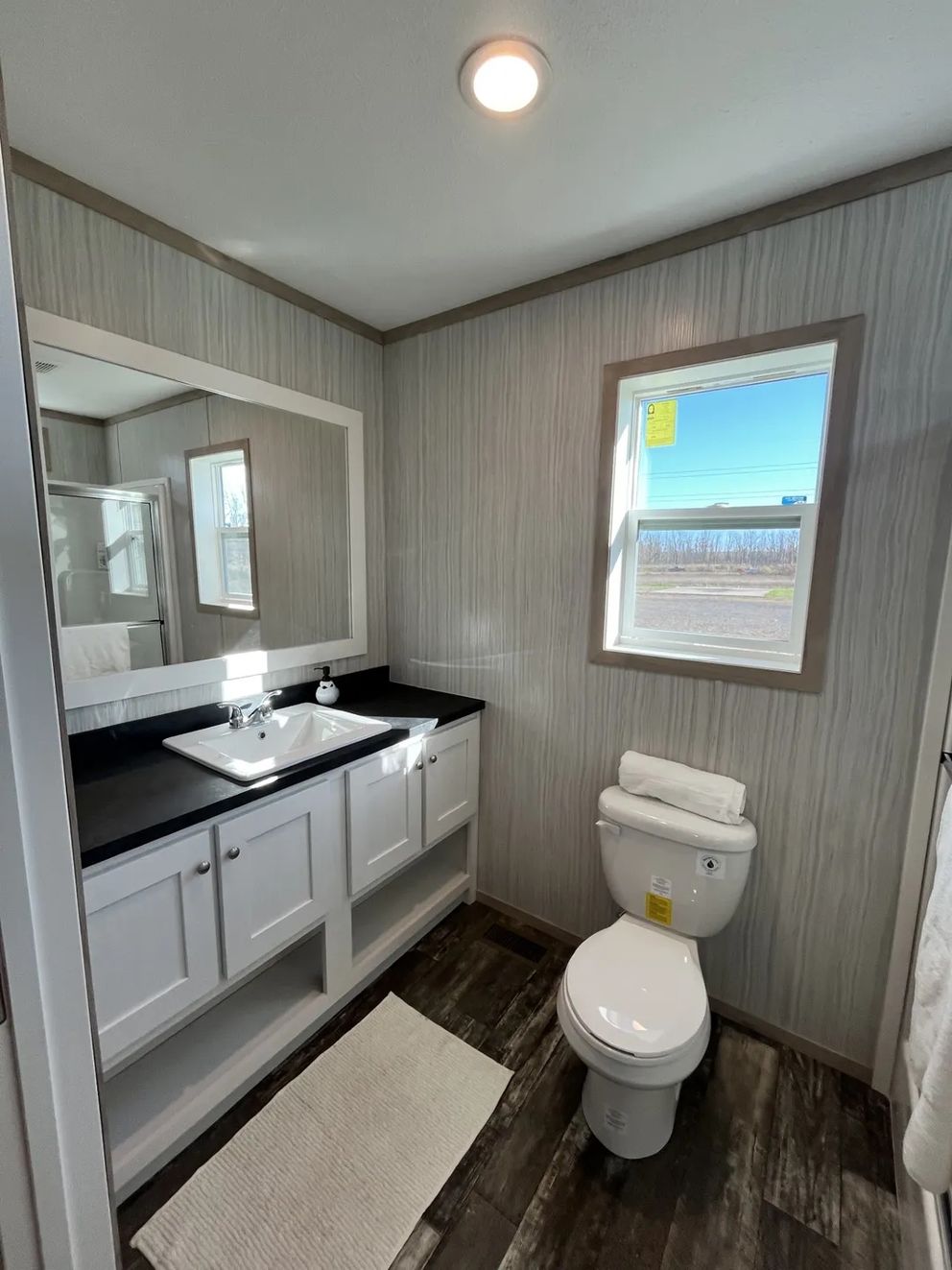 The SAPPHIRE Guest Bathroom. This Manufactured Mobile Home features 3 bedrooms and 2 baths.