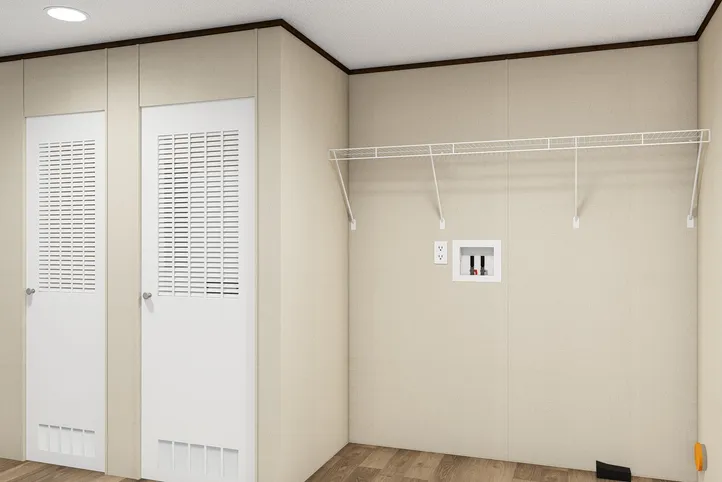 The THRILL Utility Room. This Manufactured Mobile Home features 3 bedrooms and 2 baths.