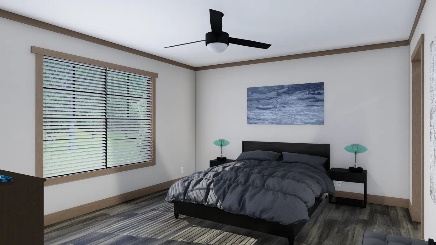 The LORALEI Primary Bedroom. This Manufactured Mobile Home features 3 bedrooms and 2 baths.