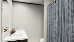 The ULTRA BREEZE 28X76 Guest Bathroom. This Manufactured Mobile Home features 4 bedrooms and 2 baths.