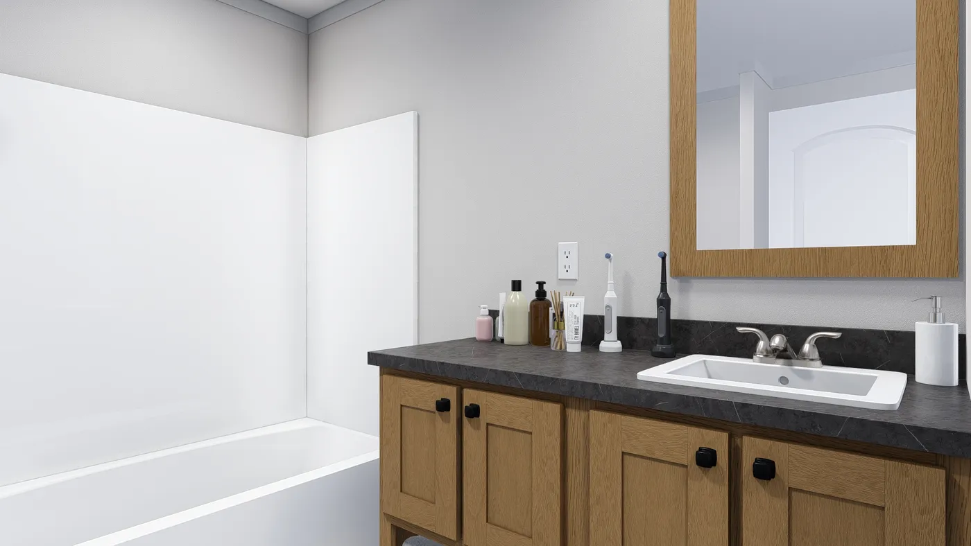 The LOVELY DAY Guest Bathroom. This Manufactured Mobile Home features 4 bedrooms and 2 baths.