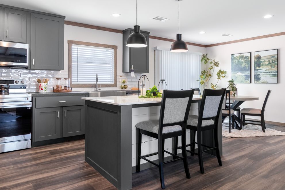 The FARM 4 FLEX Kitchen. This Manufactured Mobile Home features 4 bedrooms and 3 baths.