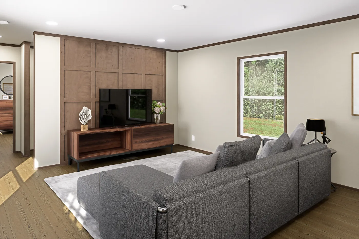 The VOYAGE Living Room. This Manufactured Mobile Home features 3 bedrooms and 2 baths.