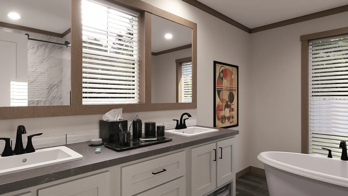 The EVERETT Primary Bathroom. This Manufactured Mobile Home features 4 bedrooms and 3 baths.