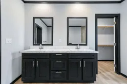 The THE ARMANI Primary Bathroom. This Manufactured Mobile Home features 3 bedrooms and 2 baths.