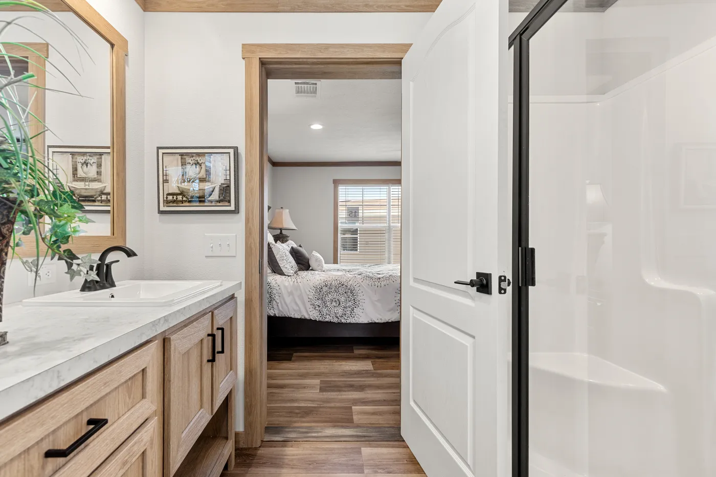 The LIZZIE Primary Bathroom. This Manufactured Mobile Home features 3 bedrooms and 2 baths.