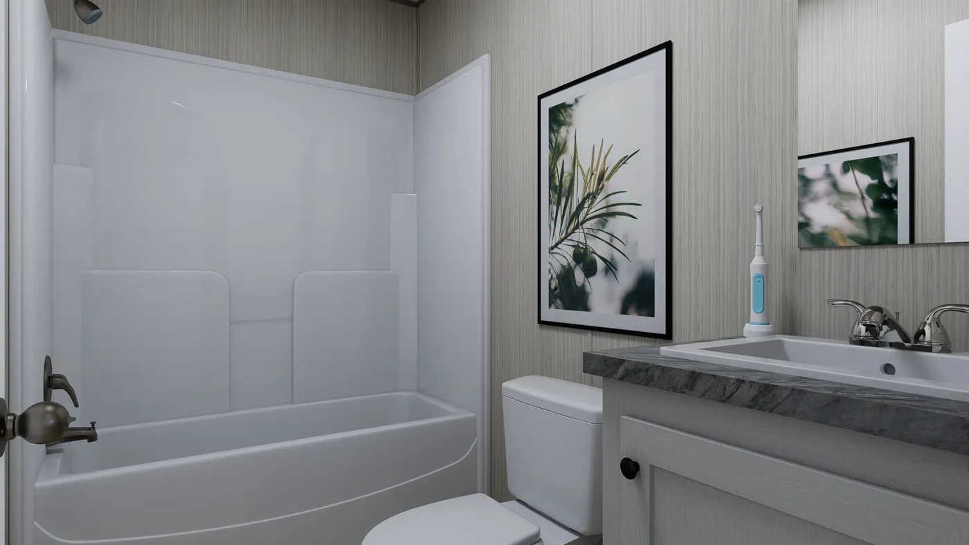 The FOOTHILLS 72 Guest Bathroom. This Manufactured Mobile Home features 3 bedrooms and 2 baths.