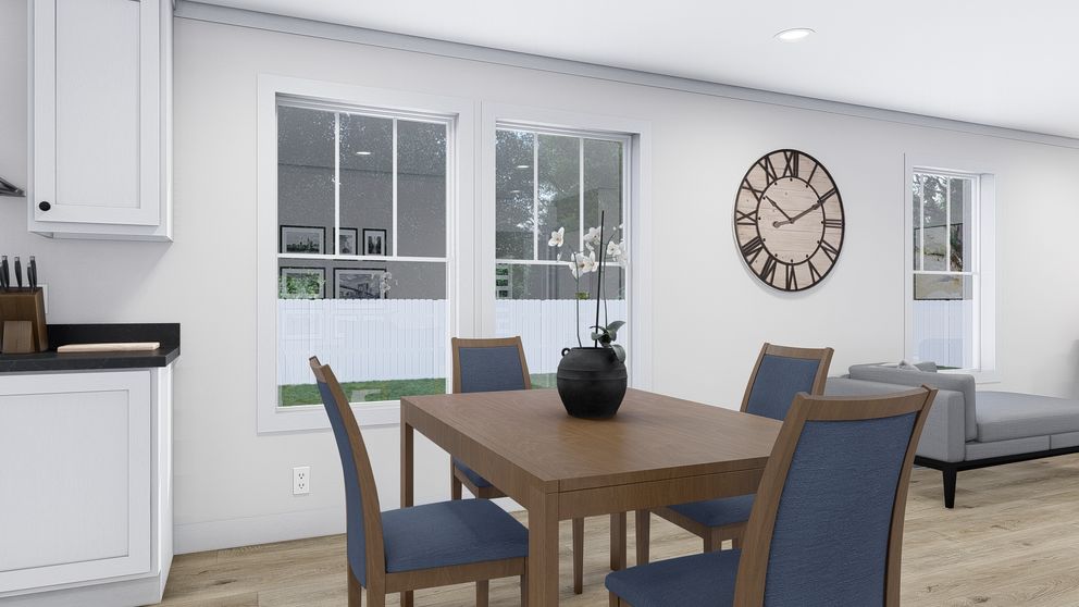The MY GIRL Dining Room. This Manufactured Mobile Home features 3 bedrooms and 2 baths.
