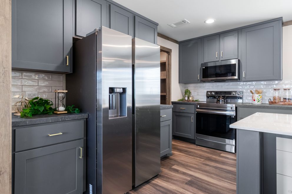 The FARM 4 FLEX Kitchen. This Manufactured Mobile Home features 4 bedrooms and 3 baths.