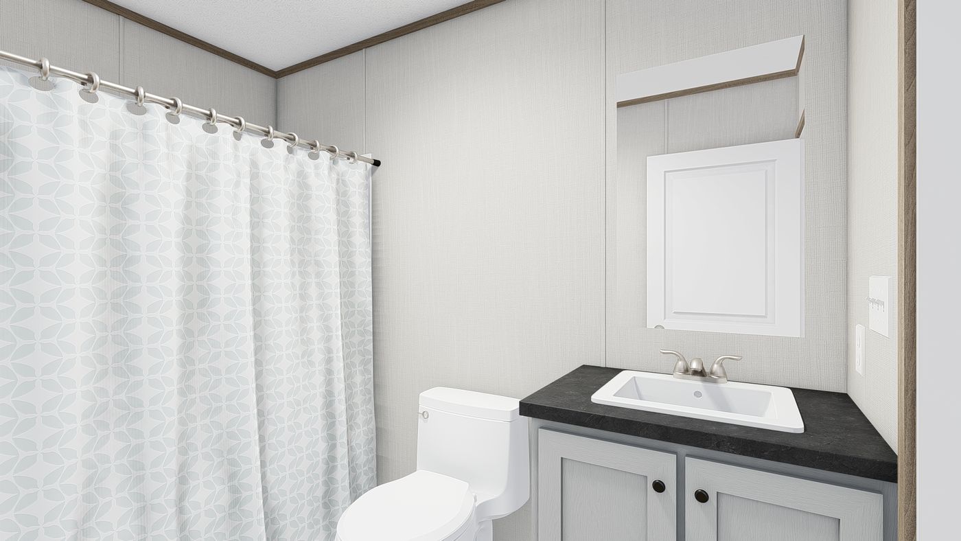 The ASPIRE Guest Bathroom. This Manufactured Mobile Home features 3 bedrooms and 2 baths.