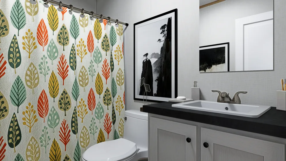The LUMEN Guest Bathroom. This Manufactured Mobile Home features 3 bedrooms and 2 baths.