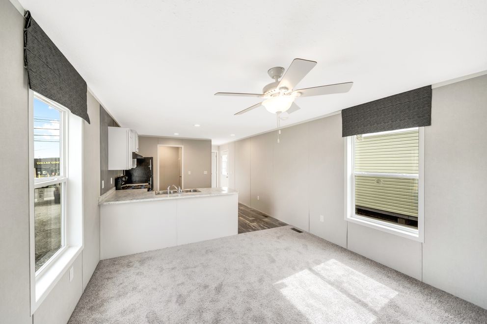The RUBY Living Room. This Manufactured Mobile Home features 2 bedrooms and 2 baths.