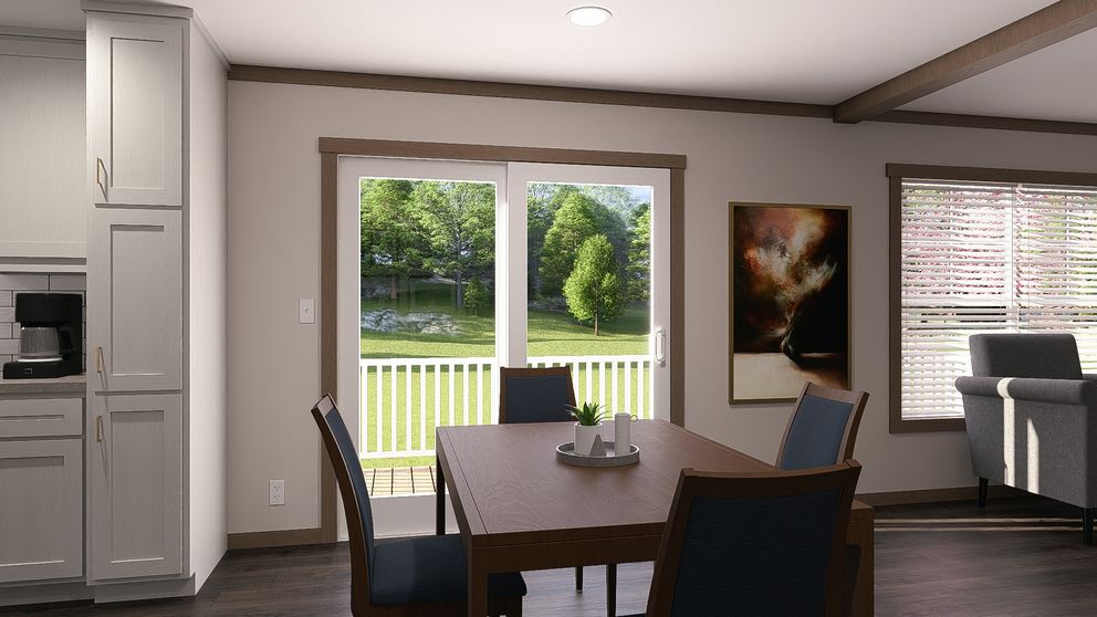 The ISABELLA Dining Room. This Manufactured Mobile Home features 3 bedrooms and 2 baths.