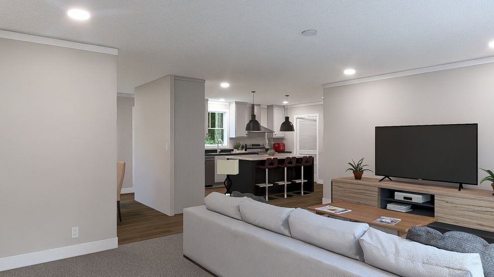 The SHOUT Living Room. This Manufactured Mobile Home features 3 bedrooms and 2 baths.