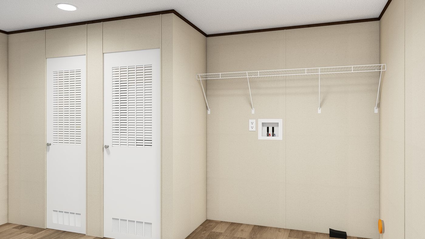 The THRILL Utility Room. This Manufactured Mobile Home features 3 bedrooms and 2 baths.