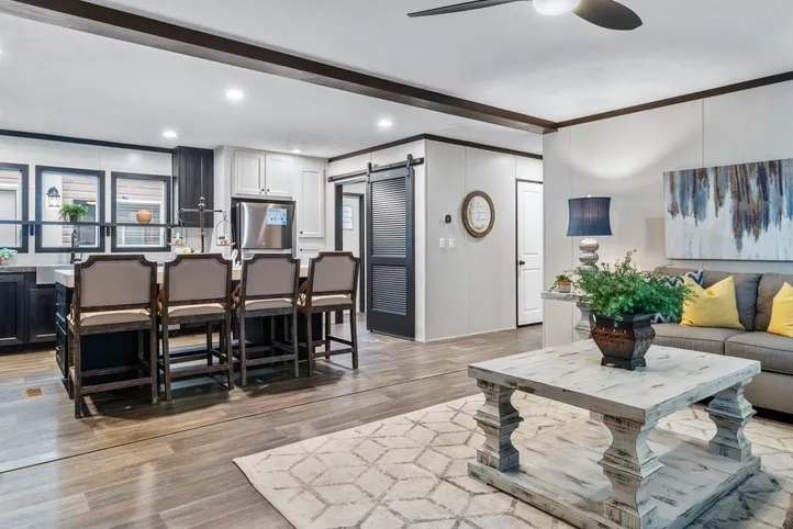 The THE RENEGADE Living Room. This Manufactured Mobile Home features 3 bedrooms and 2 baths.