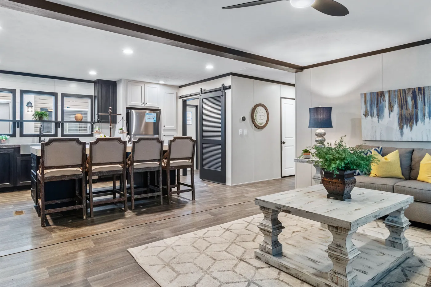 The THE RENEGADE Living Room. This Manufactured Mobile Home features 3 bedrooms and 2 baths.