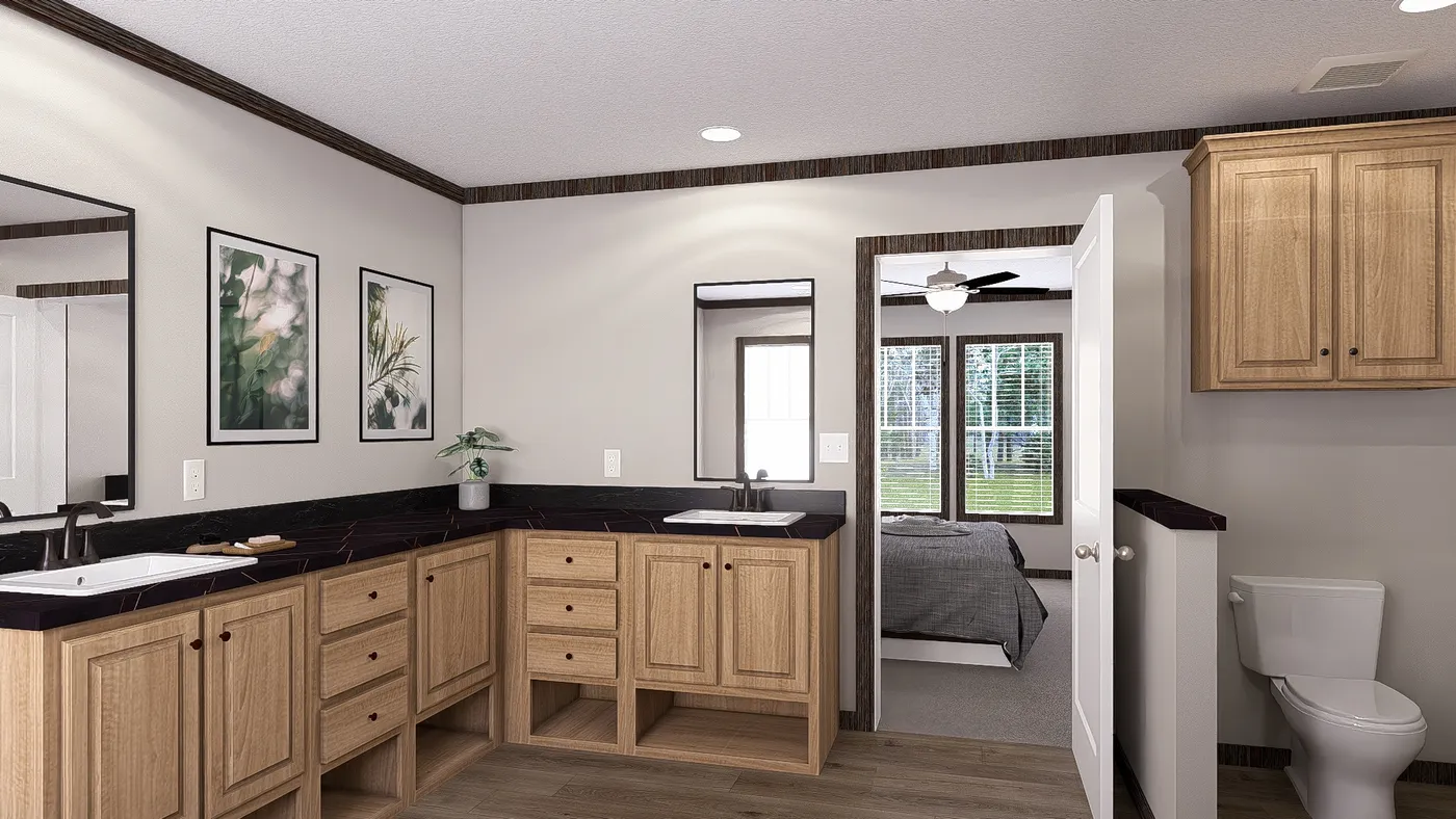 The THE JACKSON Primary Bathroom. This Manufactured Mobile Home features 4 bedrooms and 2 baths.