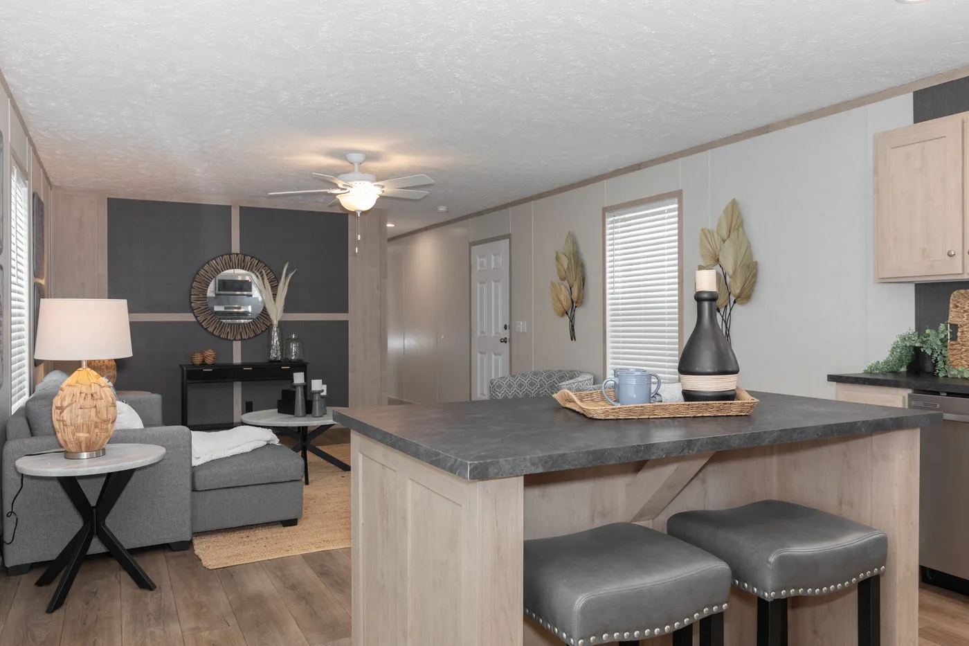 The 7616-4200 ADRENALINE Living Room. This Manufactured Mobile Home features 3 bedrooms and 2 baths.