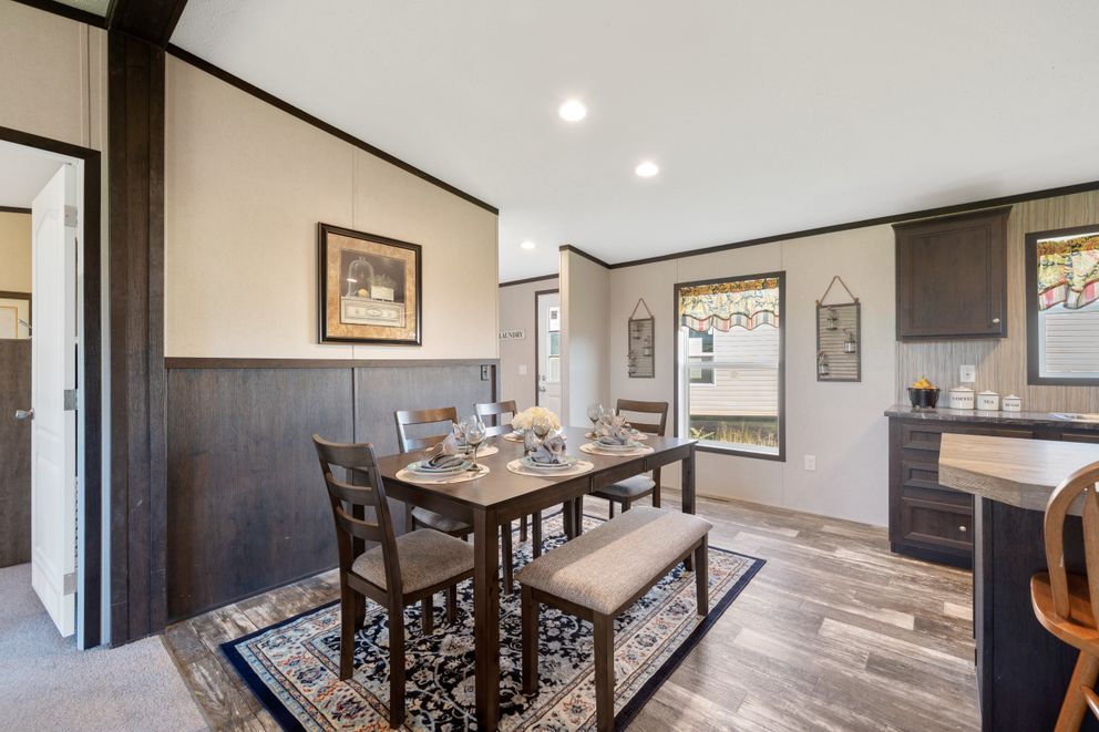 The GARNET Dining Area. This Manufactured Mobile Home features 3 bedrooms and 2 baths.