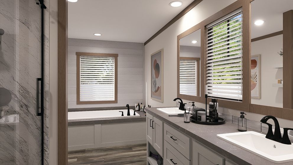 The SAWYER ELITE Primary Bathroom. This Manufactured Mobile Home features 3 bedrooms and 2 baths.
