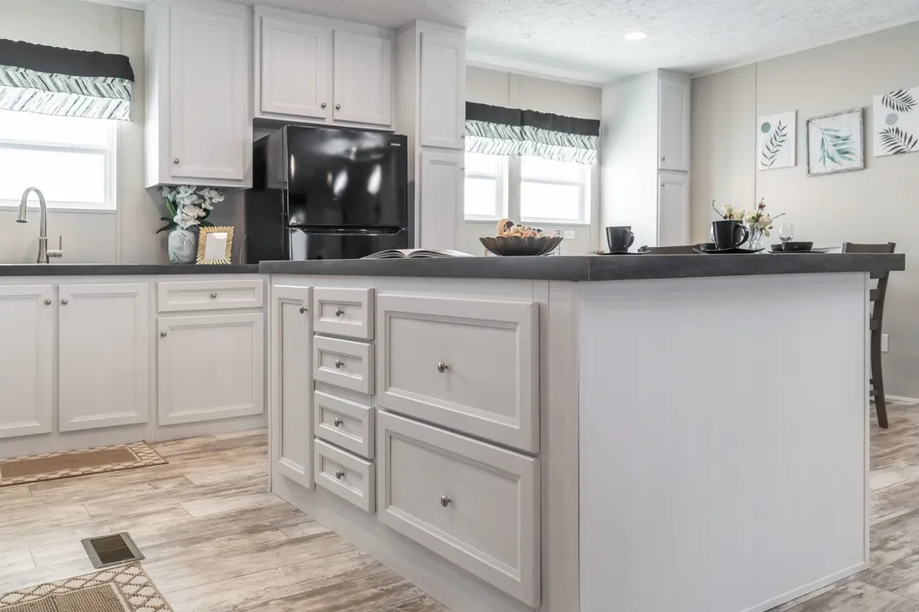 The BENJAMIN Kitchen. This Manufactured Mobile Home features 3 bedrooms and 2 baths.
