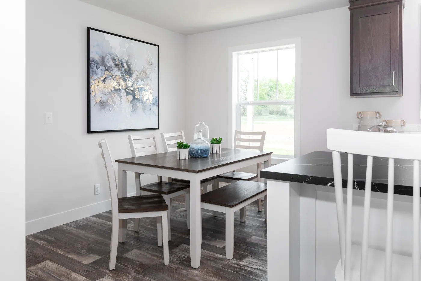 The ECLIPSE/6028-MS063 Dining Room. This Manufactured Mobile Home features 3 bedrooms and 2 baths.