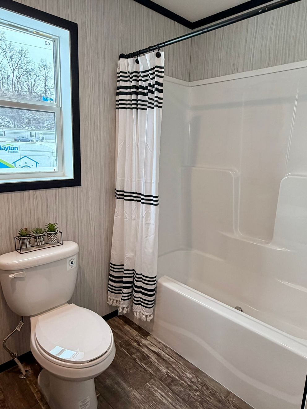 The PEARL Primary Bathroom. This Manufactured Mobile Home features 3 bedrooms and 2 baths.
