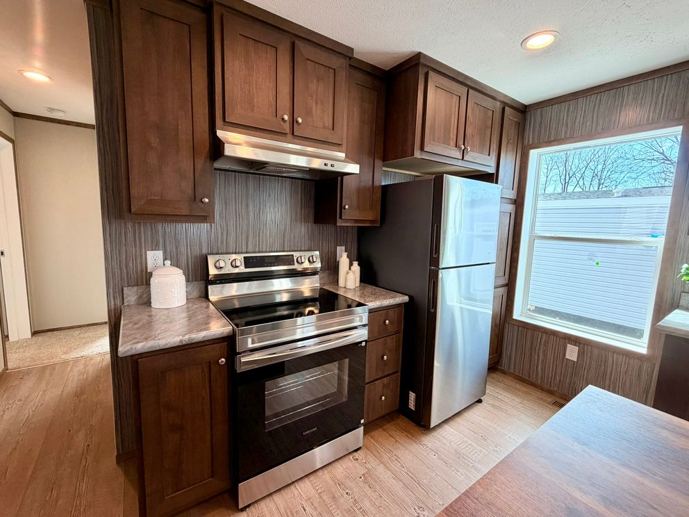 The APATITE Kitchen. This Manufactured Mobile Home features 3 bedrooms and 2 baths.