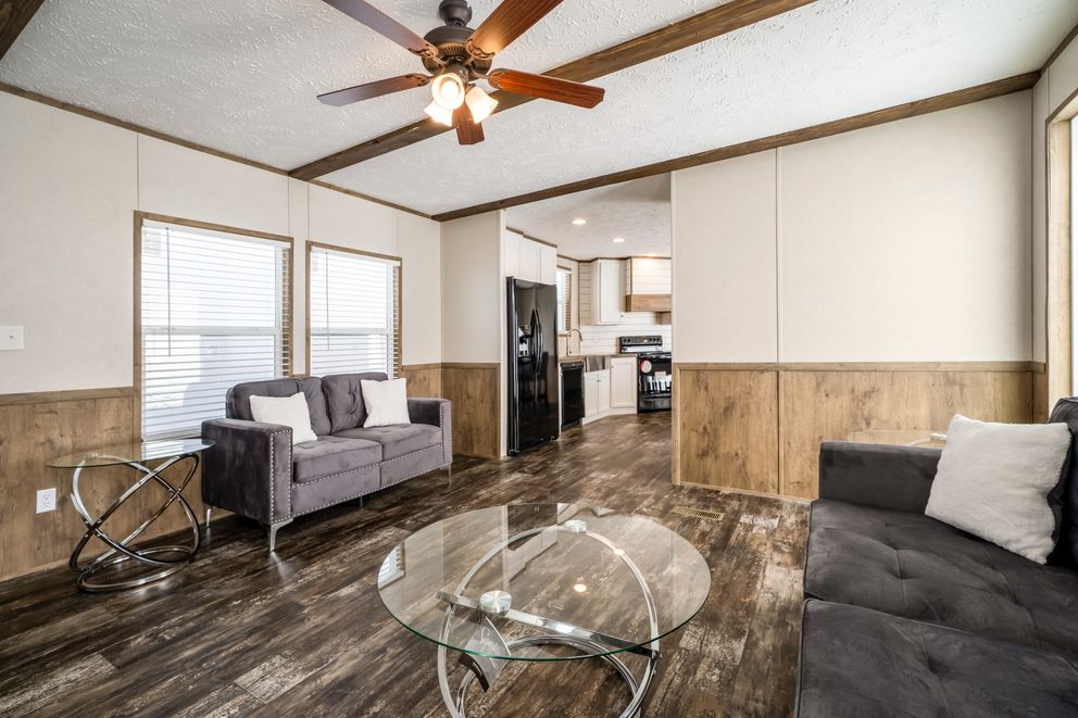 The ANNIVERSARY ENTERTAINER Exterior. This Manufactured Mobile Home features 3 bedrooms and 2 baths.