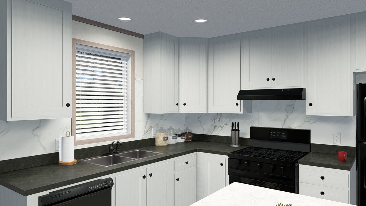 The 6616-4779 THE PULSE Kitchen. This Manufactured Mobile Home features 3 bedrooms and 2 baths.