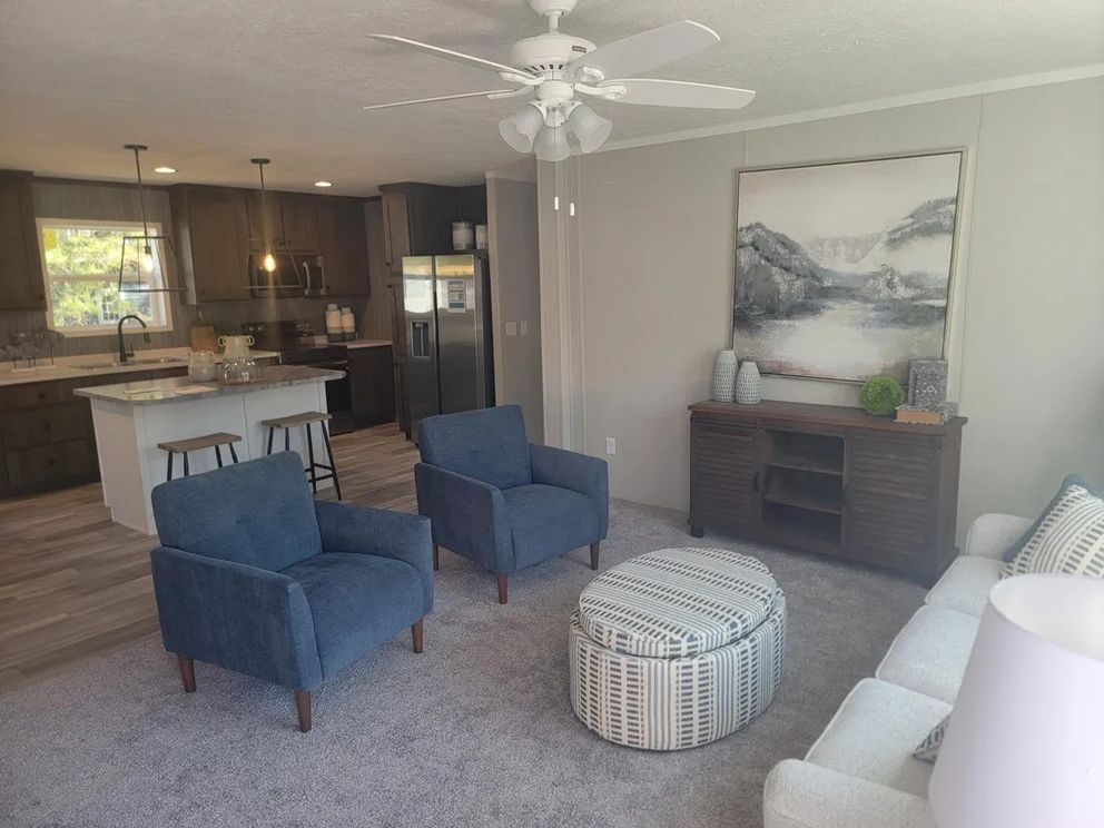 The AMETHYST 52 Living Room. This Manufactured Mobile Home features 3 bedrooms and 2 baths.