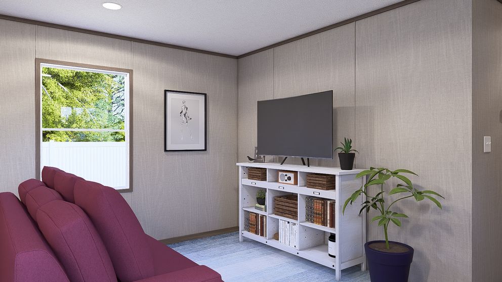The LEGEND 14X66 Living Room. This Manufactured Mobile Home features 3 bedrooms and 2 baths.