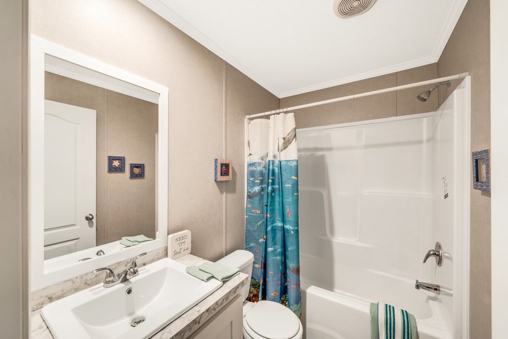 The SWEET BREEZE 76 Guest Bathroom. This Manufactured Mobile Home features 3 bedrooms and 2 baths.