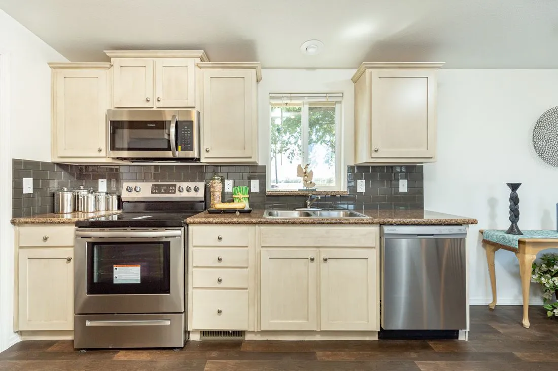 The 2017 COLUMBIA RIVER (NEW) Kitchen. This Manufactured Mobile Home features 3 bedrooms and 2 baths.