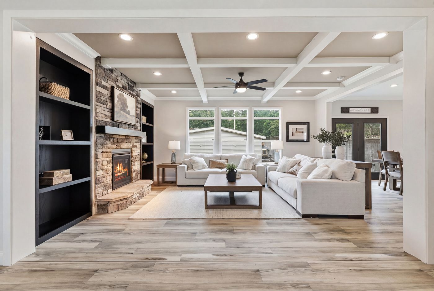 The THE SUMMIT Living Room. This Manufactured Mobile Home features 3 bedrooms and 2 baths.