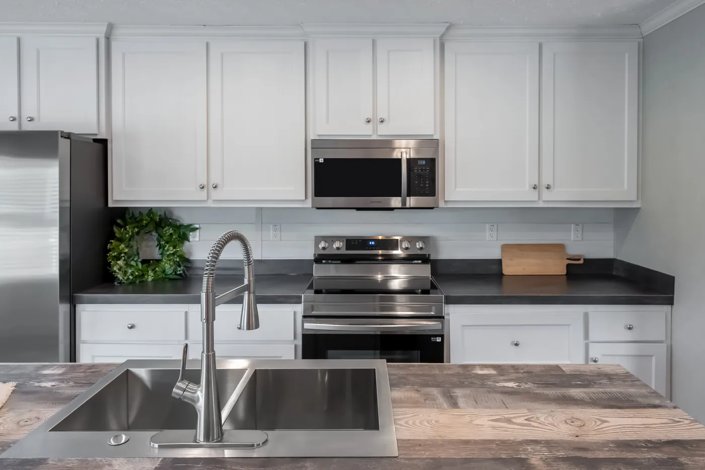 The NORTHSHORE Kitchen. This Manufactured Mobile Home features 3 bedrooms and 2 baths.