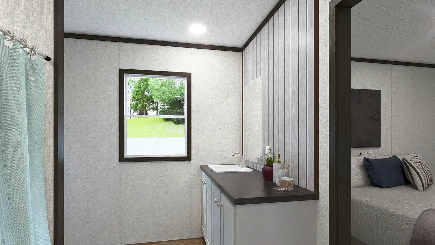 The ESSENCE Primary Bathroom. This Manufactured Mobile Home features 3 bedrooms and 2 baths.