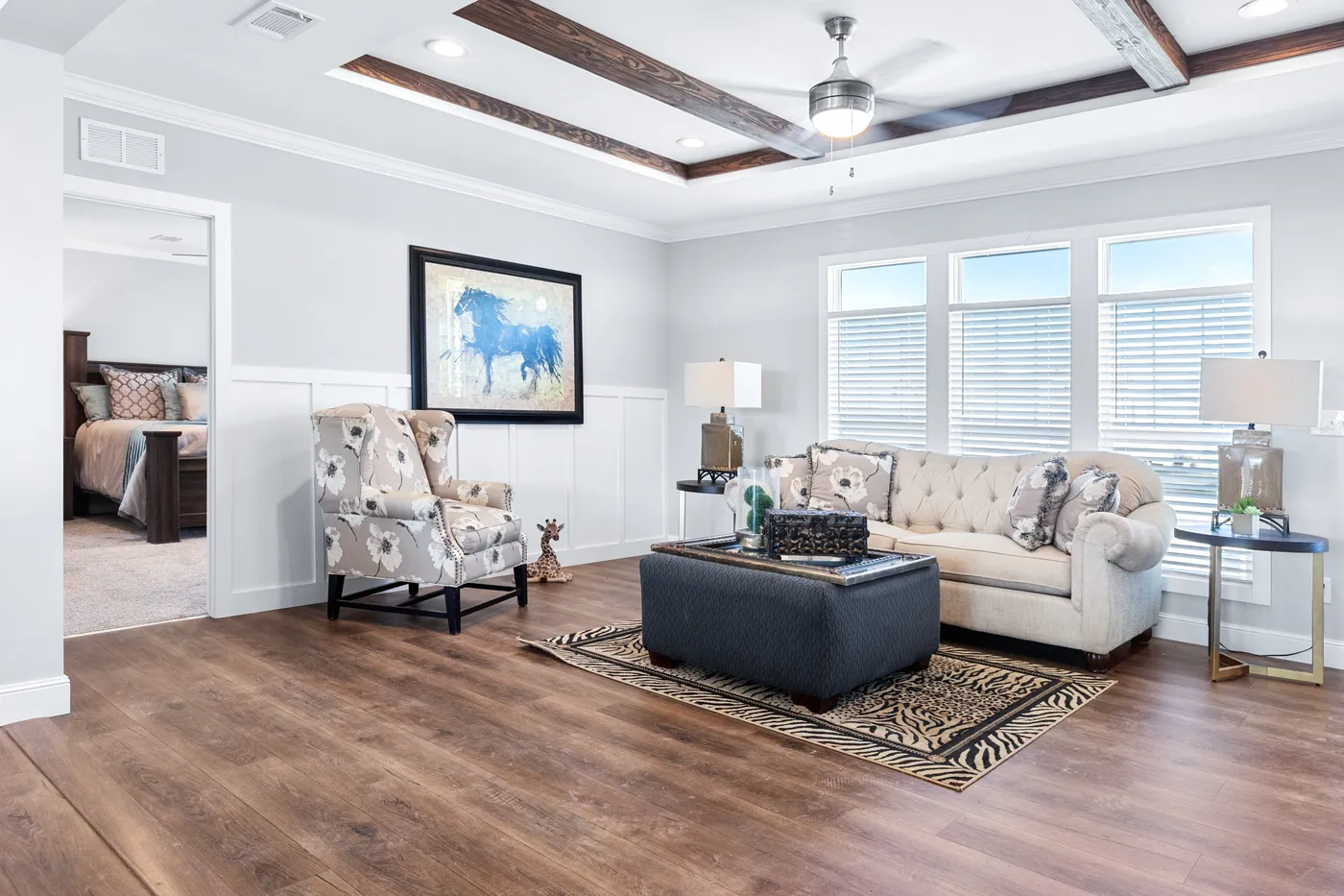 The THE FUJI Living Room. This Manufactured Mobile Home features 4 bedrooms and 3 baths.