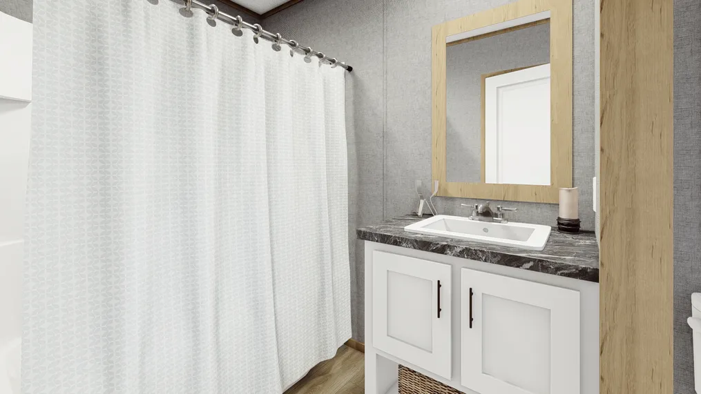 The CLARK 7016-1066 Guest Bathroom. This Manufactured Mobile Home features 3 bedrooms and 2 baths.