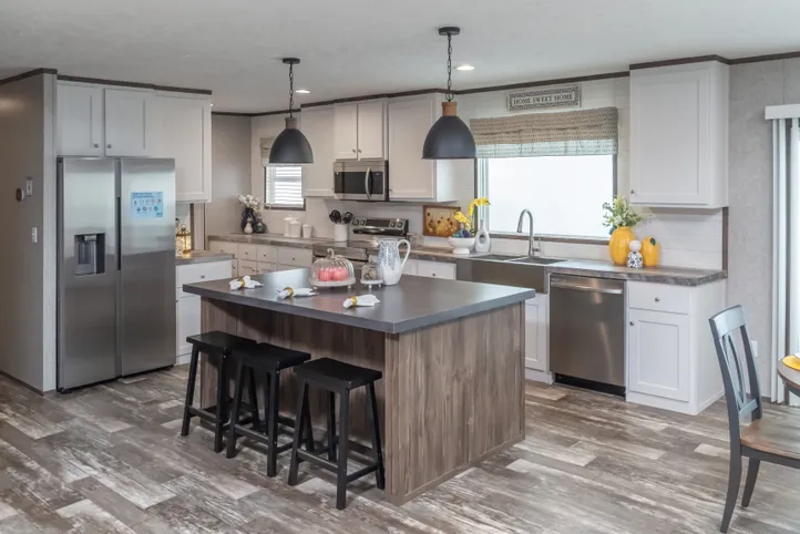 The LOCKLEAR Exterior. This Manufactured Mobile Home features 4 bedrooms and 2 baths.