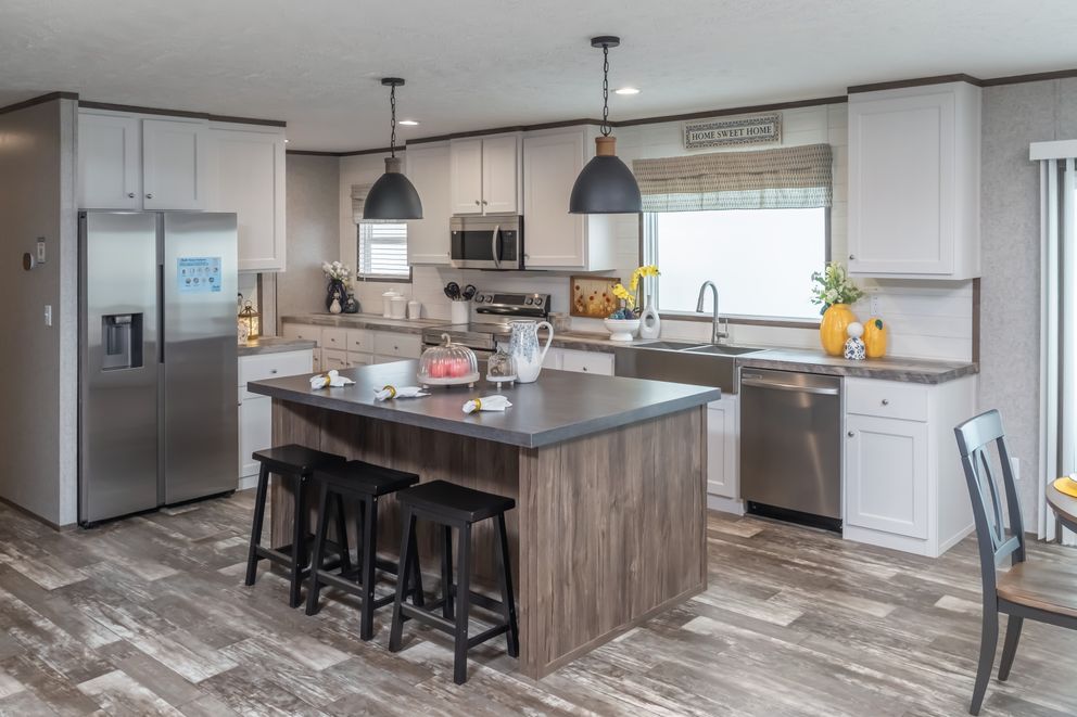 The LOCKLEAR Exterior. This Manufactured Mobile Home features 4 bedrooms and 2 baths.