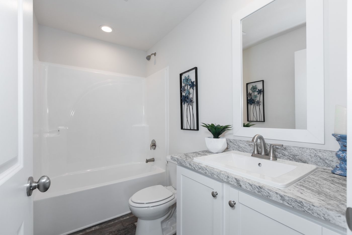 The ECLIPSE/6028-MS063 Guest Bathroom. This Manufactured Mobile Home features 3 bedrooms and 2 baths.