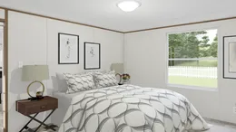 The GRAND Primary Bedroom. This Manufactured Mobile Home features 4 bedrooms and 2 baths.