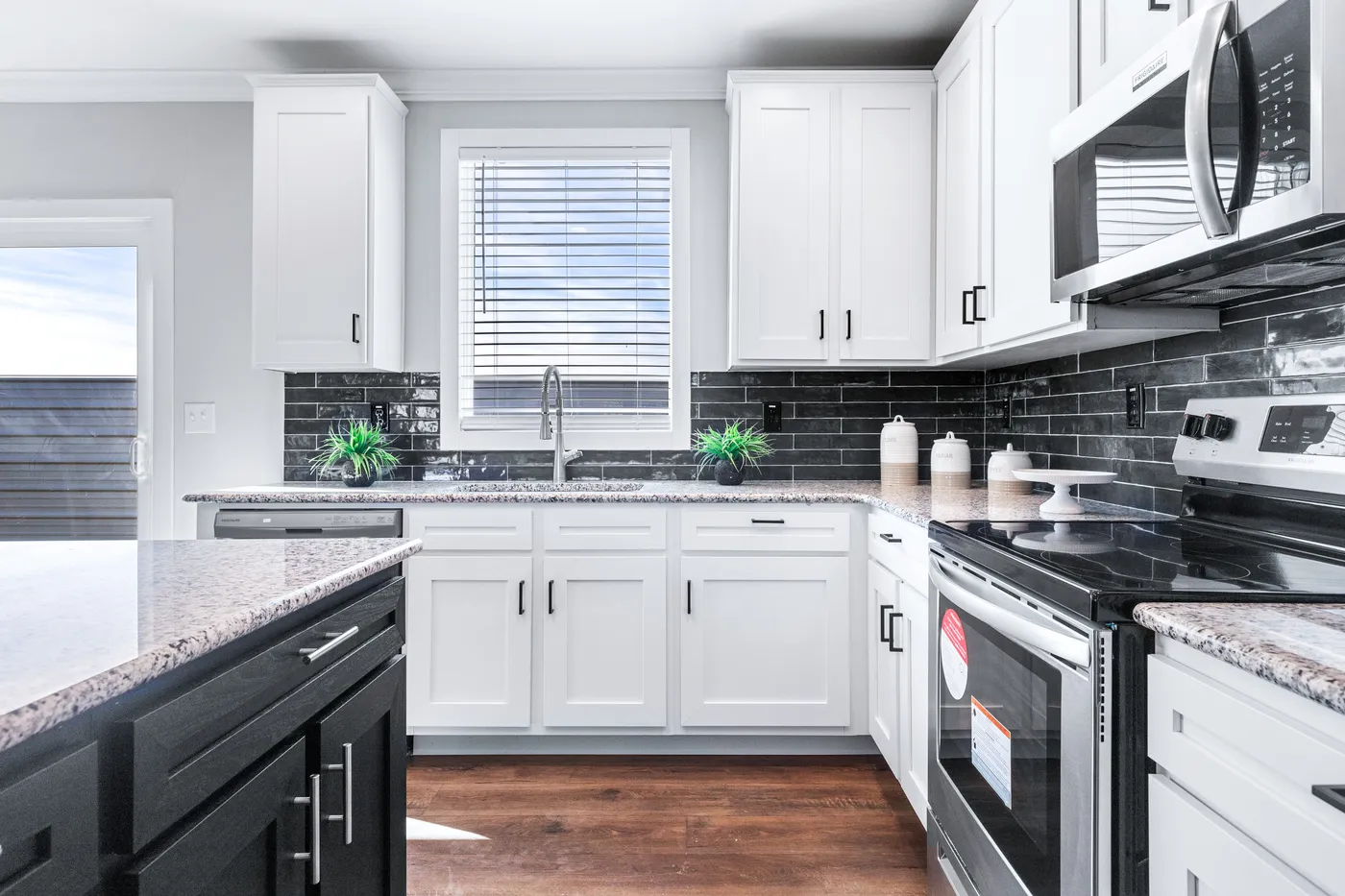 The THE FUJI Kitchen. This Manufactured Mobile Home features 4 bedrooms and 3 baths.