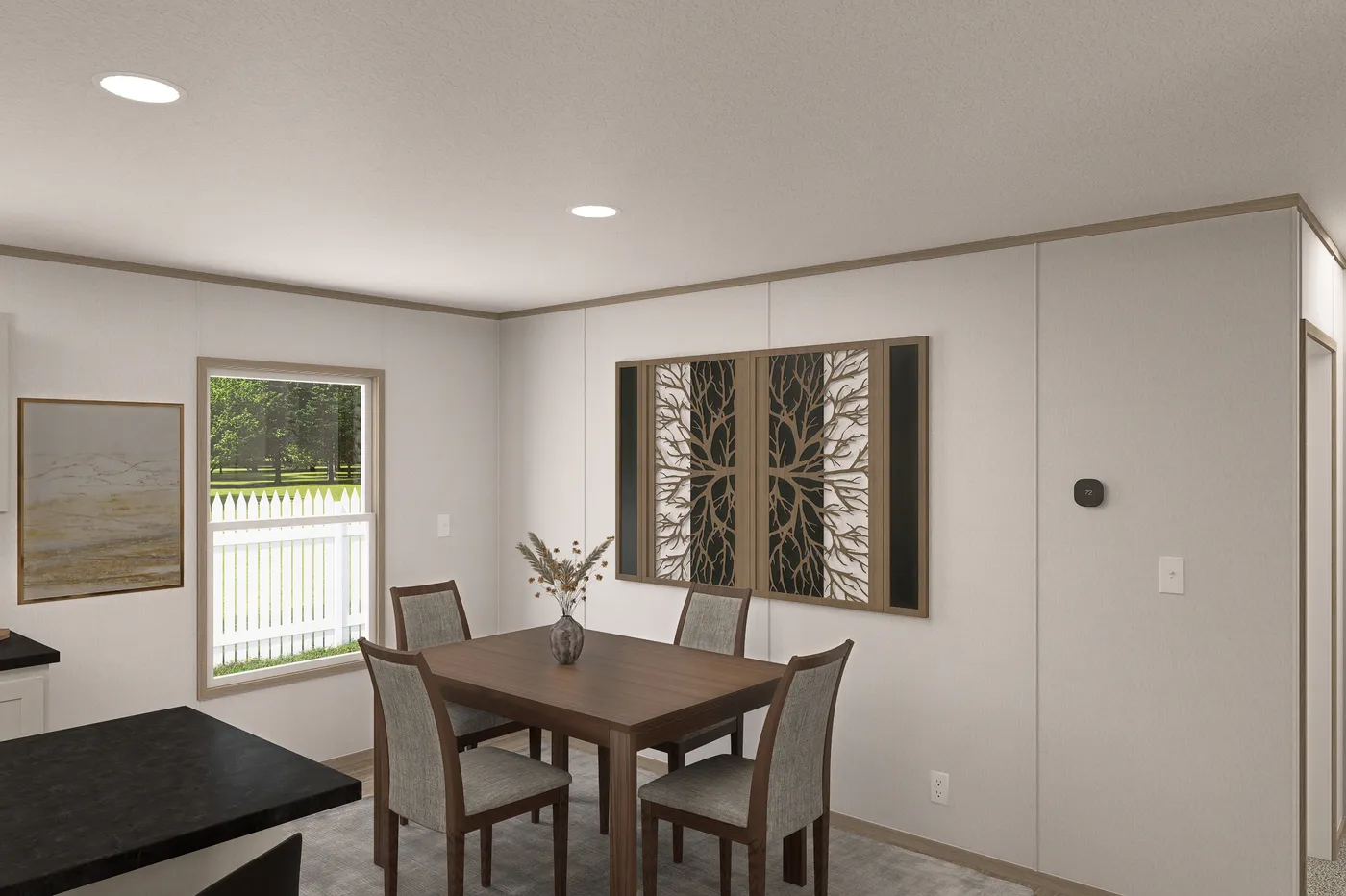The THE EAGLE 48 Dining Area. This Manufactured Mobile Home features 3 bedrooms and 2 baths.