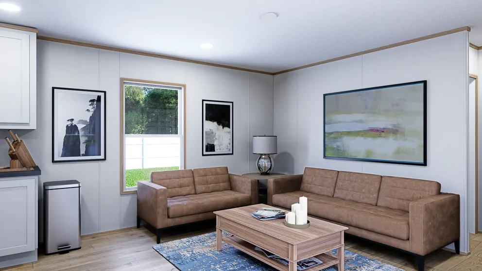 The EMBER Living Room. This Manufactured Mobile Home features 2 bedrooms and 2 baths.