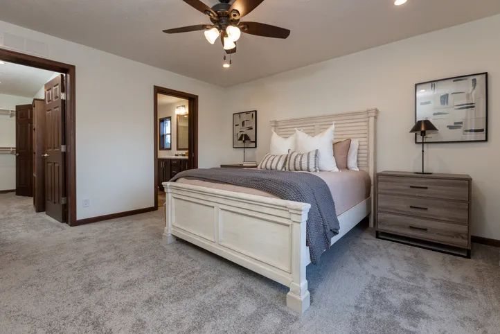 The LEGEND 86 Primary Bedroom. This Manufactured Mobile Home features 3 bedrooms and 2 baths.