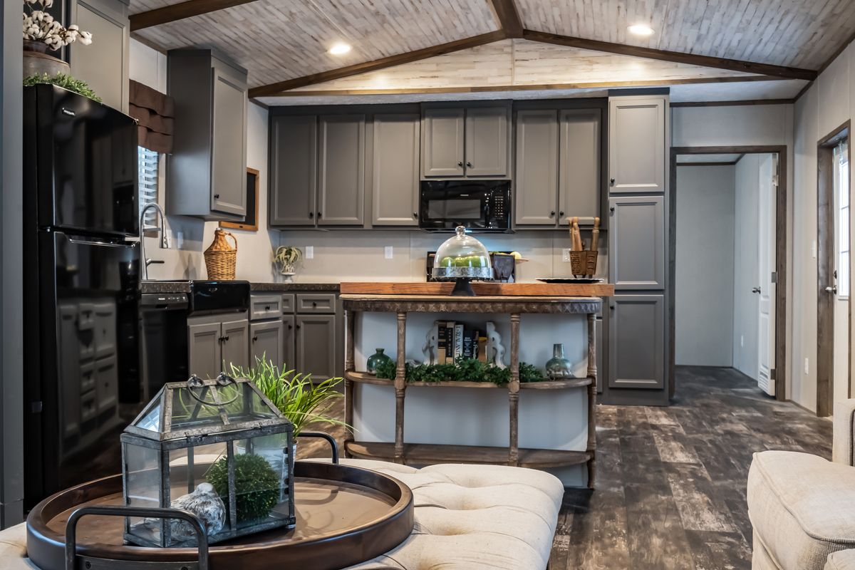 The ALPINE RIDGE Exterior. This Manufactured Mobile Home features 3 bedrooms and 2 baths.