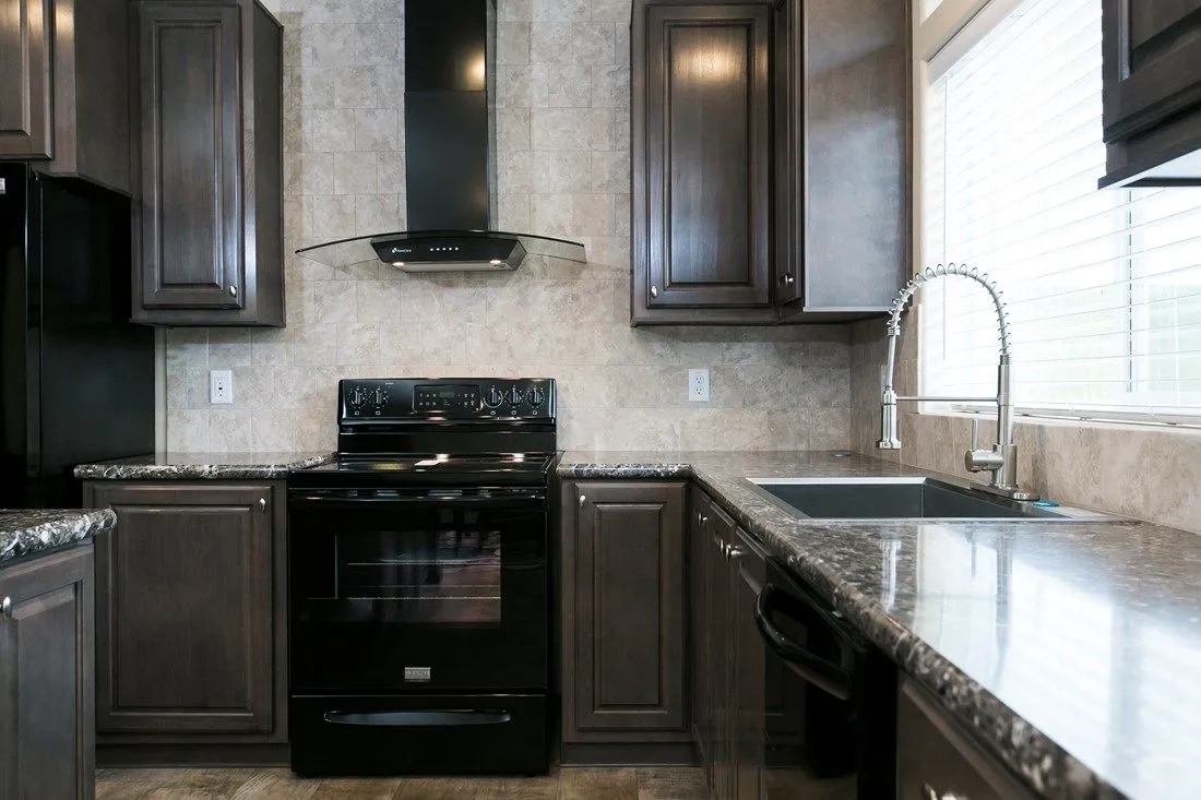 The 2023 COLUMBIA RIVER (NEW) Kitchen. This Manufactured Mobile Home features 3 bedrooms and 2 baths.